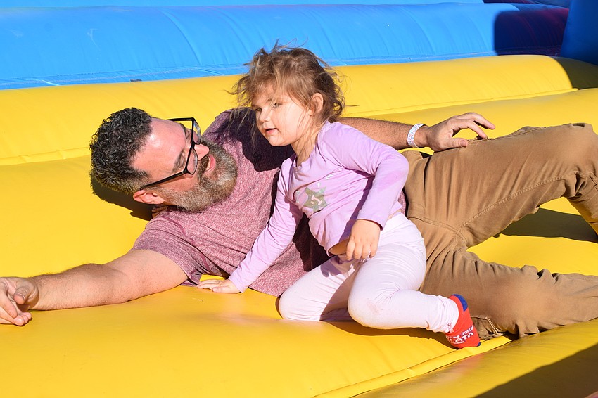Sarasota's David Rosado plays with his 2-year-old daughter Sofia Rosado.