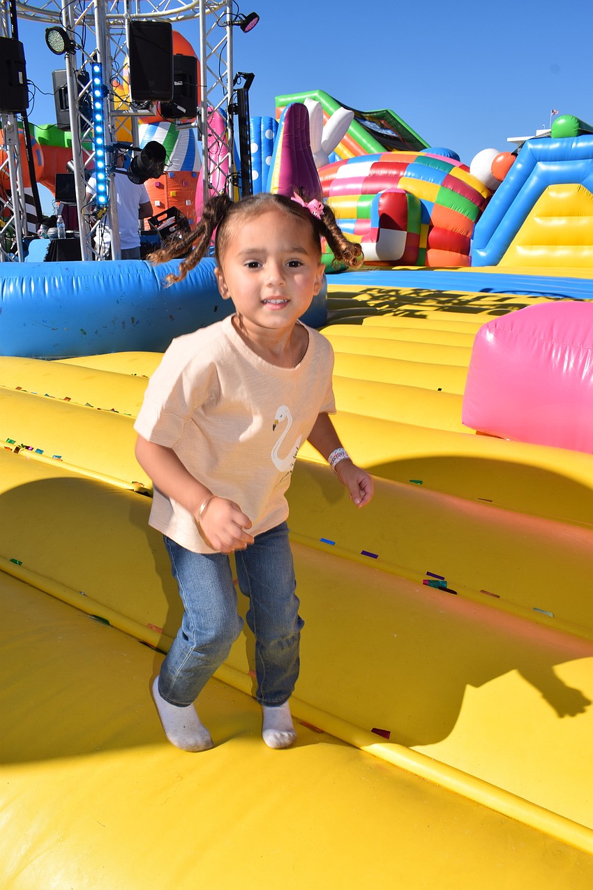 Lakewood Ranch's Rayne Harrigan has a blast bouncing around in a giant castle.