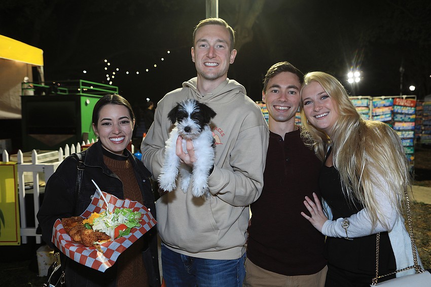 Melanie Mercado, Ben Yonko with Harlan the dog, Nate Carper and Melanie Cashell