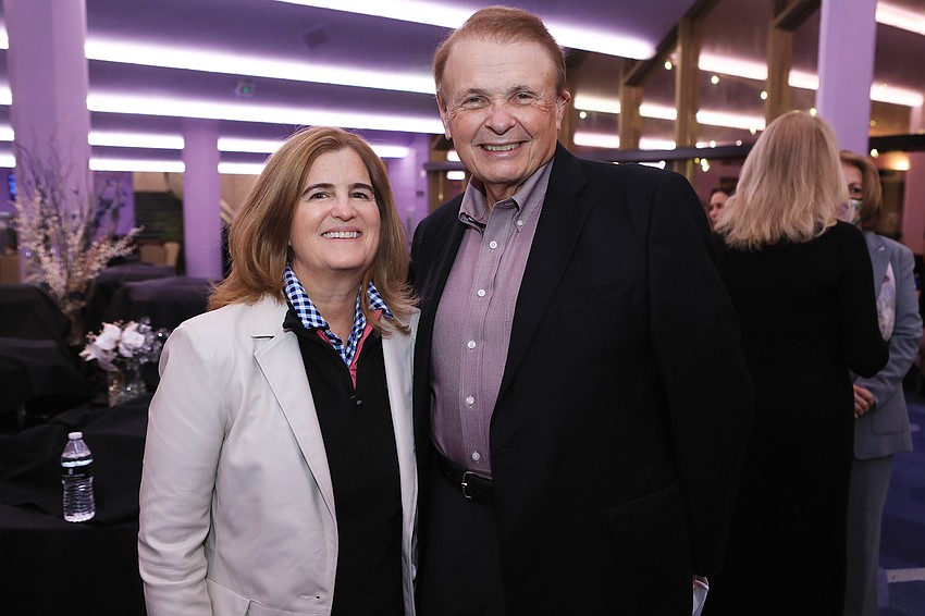 Mary Pat Christie and Larry Thompson