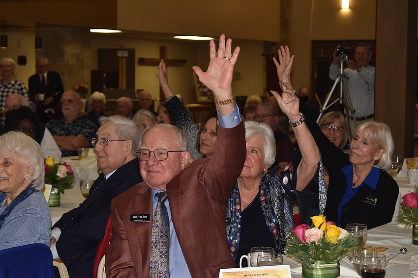 Members raised their hands to say they had attended the earliest services at the church in Bayfront Park.