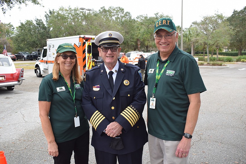 CERT event organizer Karen Emanuelson, Manatee County Emergency Management Chief Steve Litschauer and CERT President Jim Emanuelson get together before the start of the event.