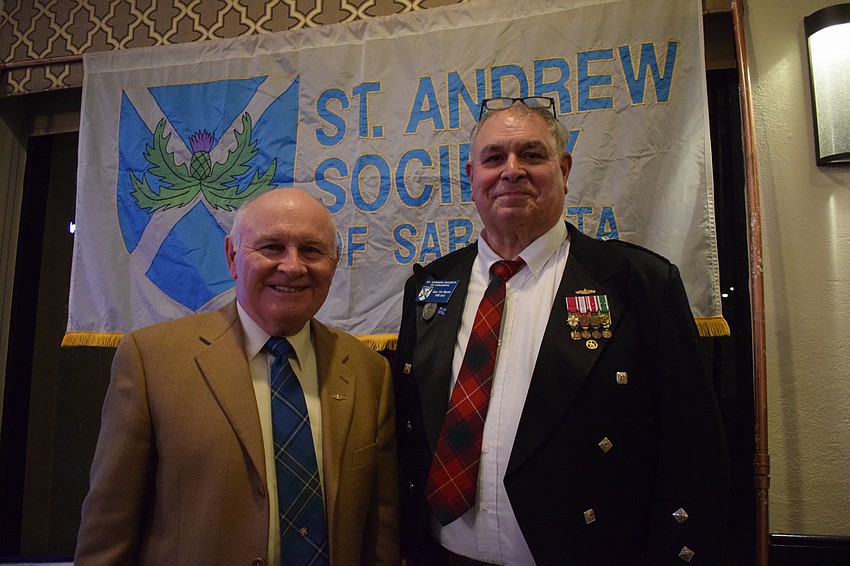 Lakewood Ranch's Mike Gaffney and Palm Aire's Capt. Carl Morris both served in the Navy and met in Virginia Beach. Morris invited Gaffney to the Burns Supper.