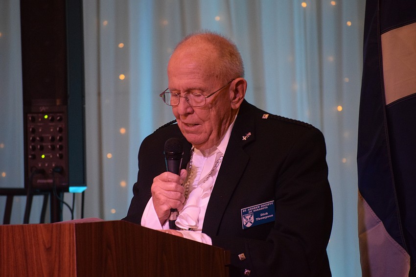 Mote Ranch's Dick Thompson says the Selkirk Grace.