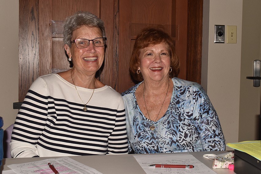 Helen Beljean and Laura Carter took tickets at the entrance.