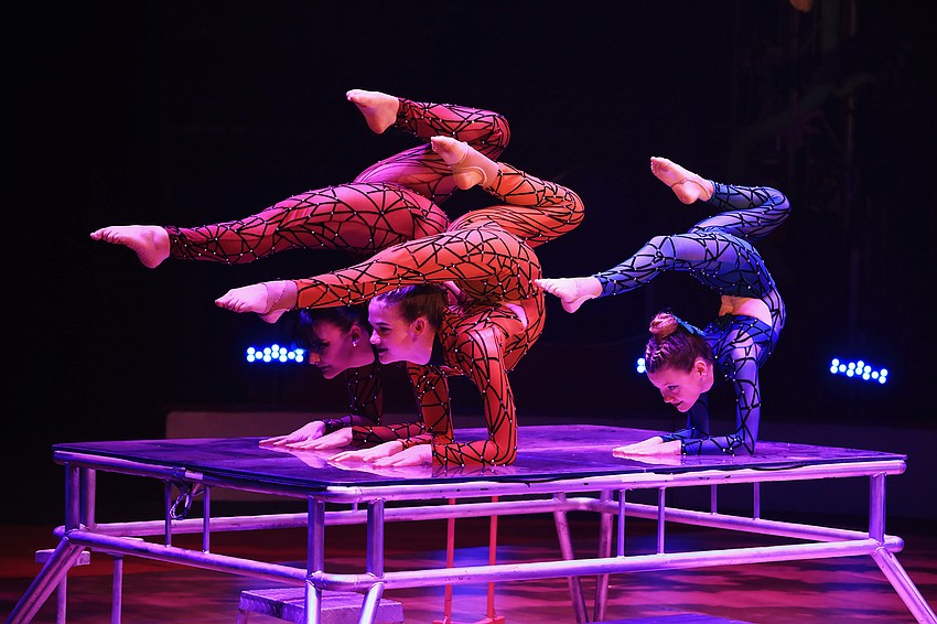 Madison Barrett, Rylee Grover and Destiny Overholt work together in a contortion showcase.