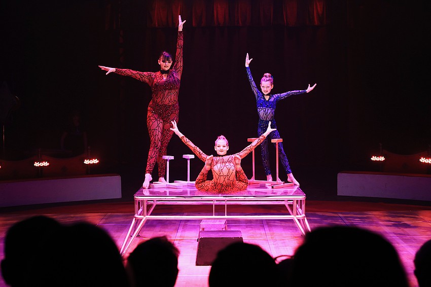 Madison Barrett, Rylee Grover and Destiny Overholt work together in a contortion showcase.