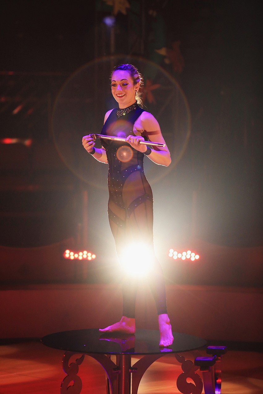 Elayne Kramer prepares for her hand balancing act.