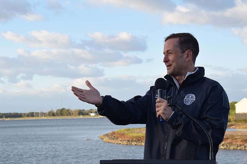 District 71 Rep. Will Robinson spoke during a brief ceremony before the race to dedicate the loop around the lake to his dad, the late Bill Robinson.