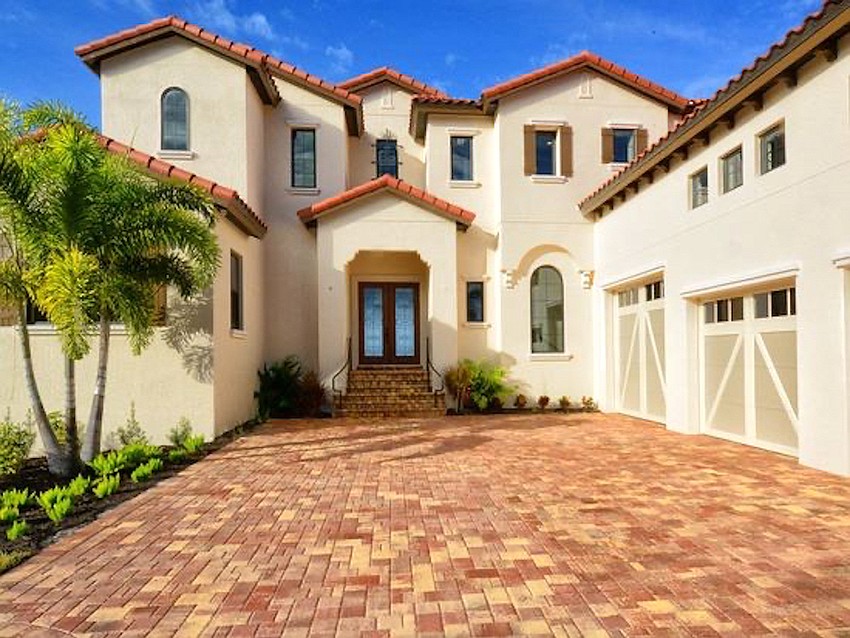 The home at 212 Bird Key Drive was built in 2018 and offers four bedrooms, four-and-two-half baths, a pool and 4,068 square feet of living area.