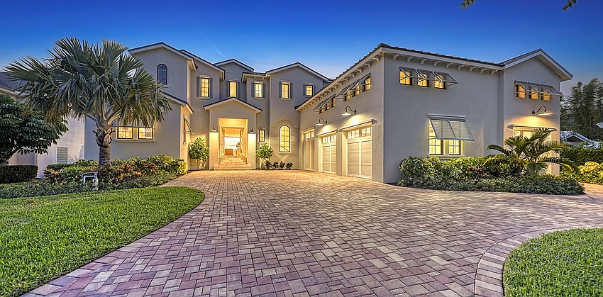 The home at 212 Bird Key Drive was built in 2018 and offers four bedrooms, four-and-two-half baths, a pool and 4,068 square feet of living area.