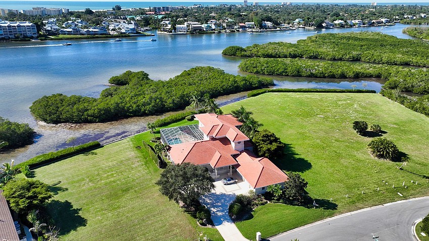 The property at 5800 Tidewood Ave.  was built in 2000, it has four bedrooms, three-and-two-half baths, a pool and 5,167 square feet of living area.