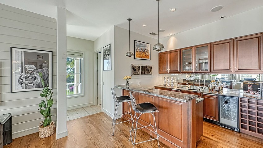 The property at 5800 Tidewood Ave.  was built in 2000, it has four bedrooms, three-and-two-half baths, a pool and 5,167 square feet of living area.