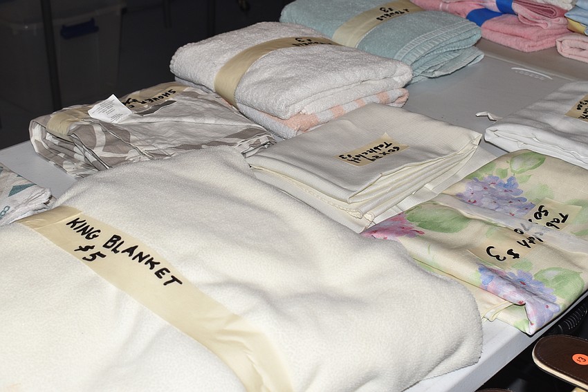 Linens were wrapped and tagged with their prices.