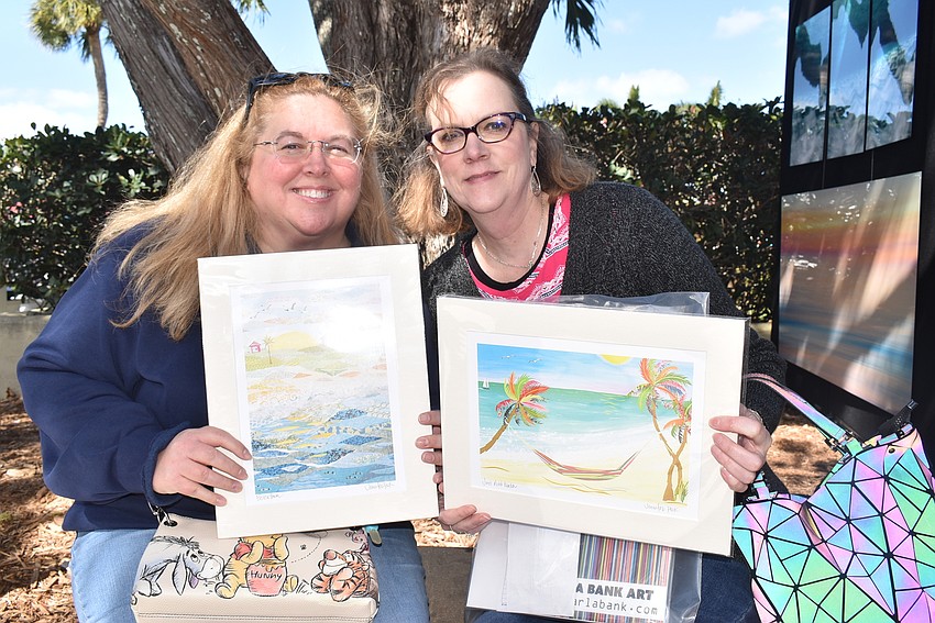 Vicki Cosey and Kirstin Reed with their purchases.