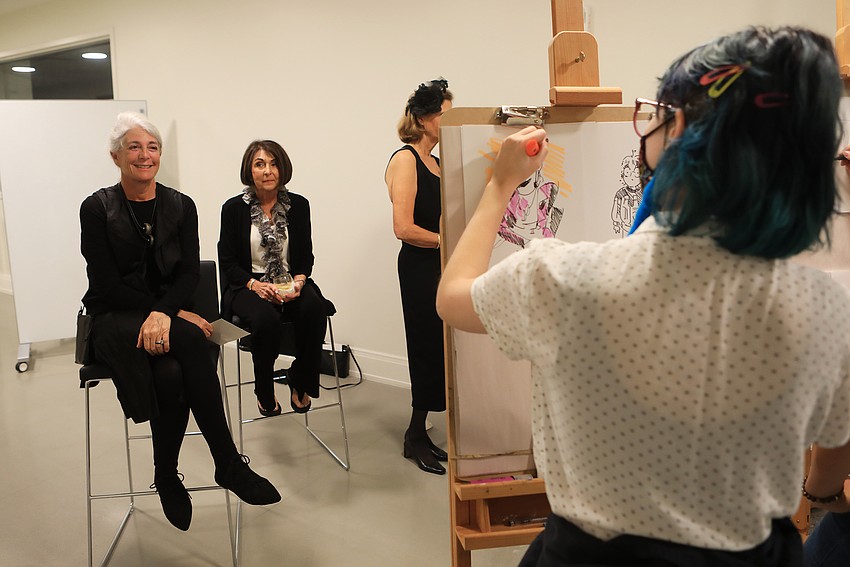 Marcy Klein has her likeness sketched out.