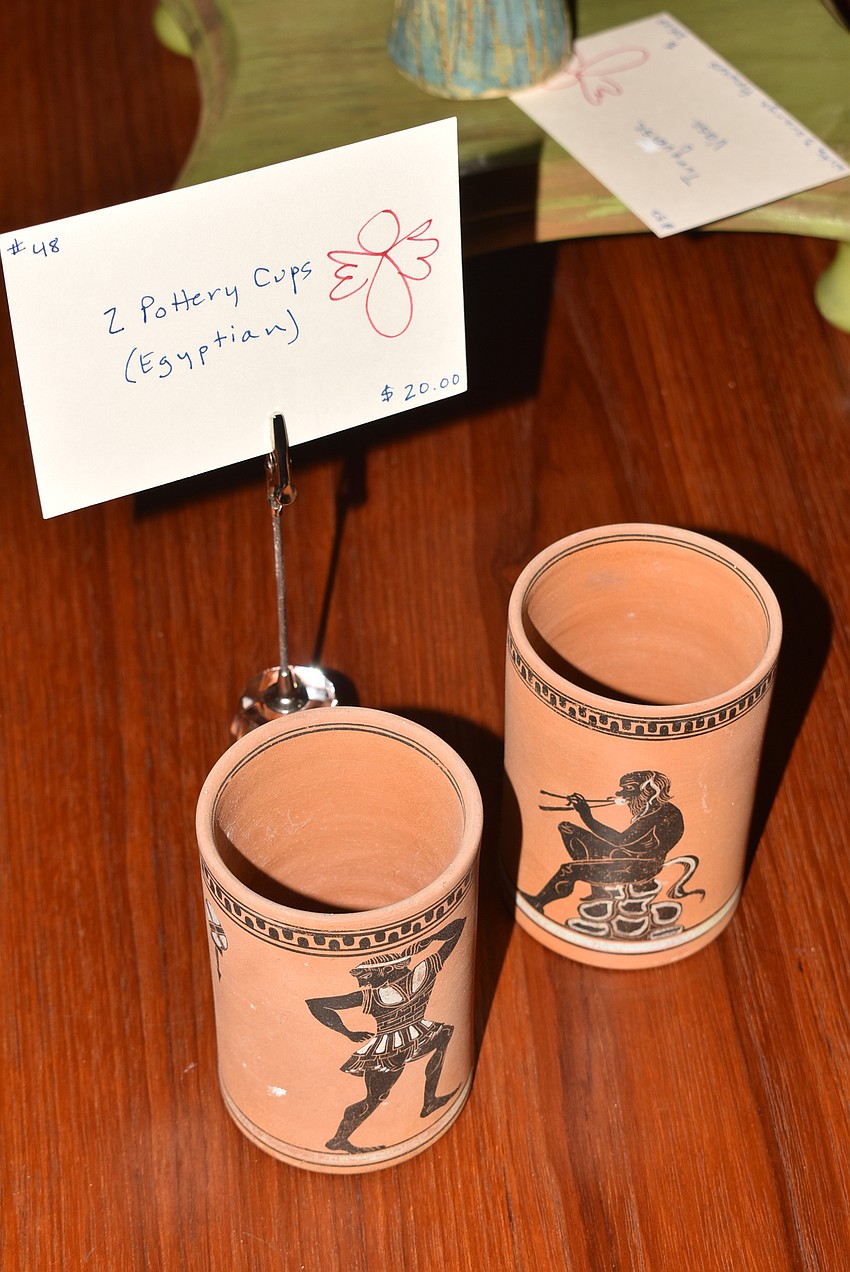 Pieces like these pottery cups were priced to sell at $20 a pair.