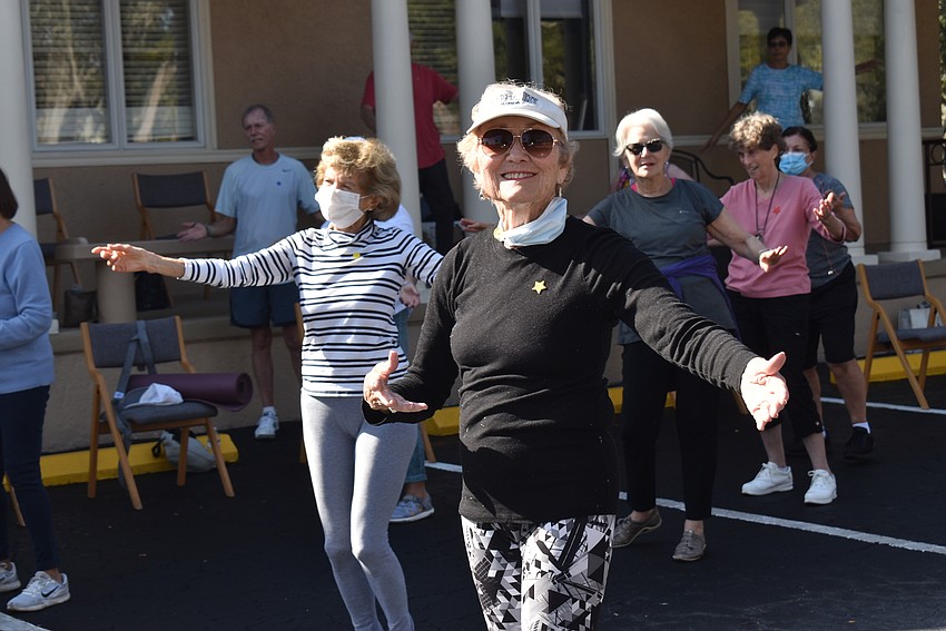 Janet Milliken smiles during hula.