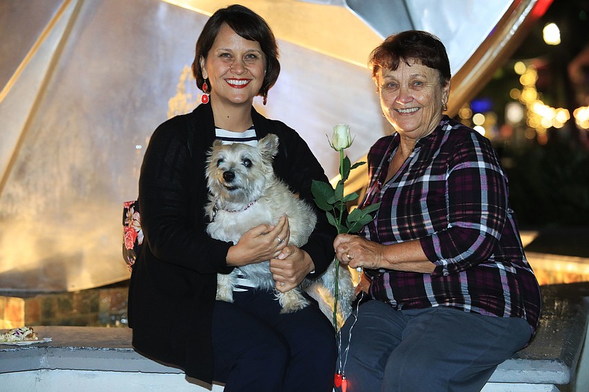 Nadia and Lucy Sawa with Ginger the dog