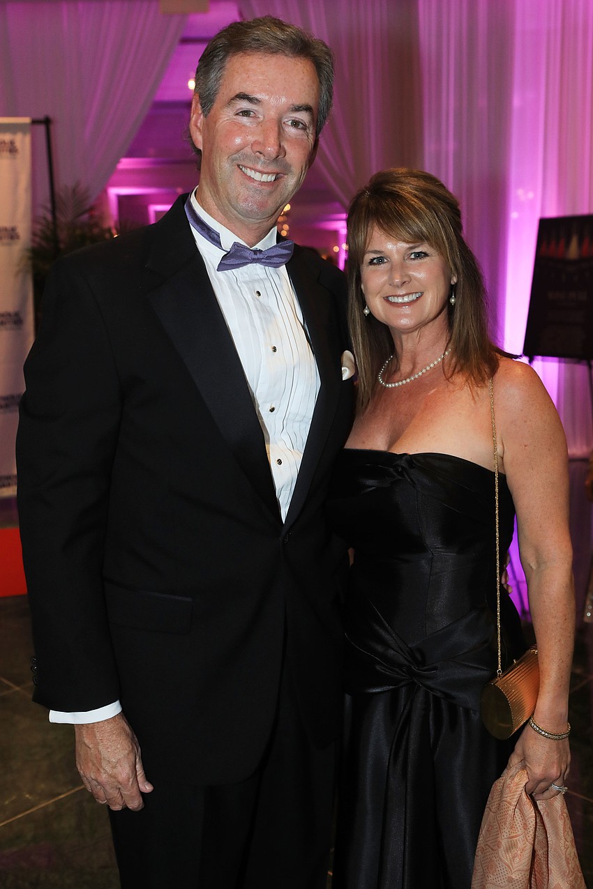 Emcee Ray Collins and Erin Hurter