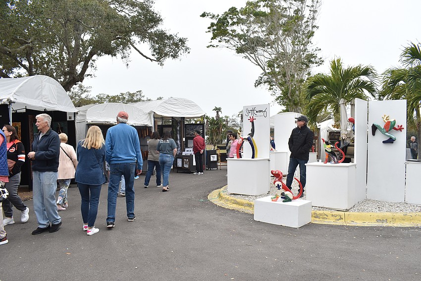 Artists set their booths up in the parking lot of Town Center Green.