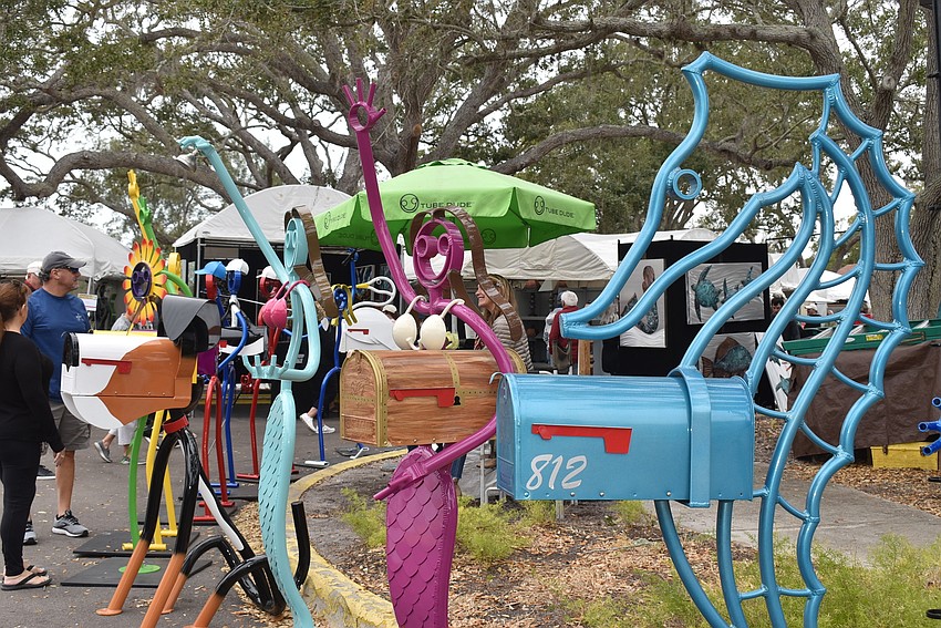 Tube Dude, who is responsible for many mailboxes along Gulf of Mexico Drive, was present.