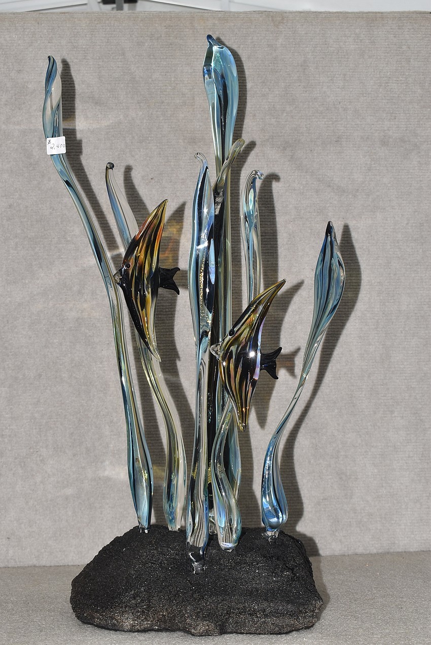 Sue Ayala's glasswork is created with a torch at 3,000 degrees.