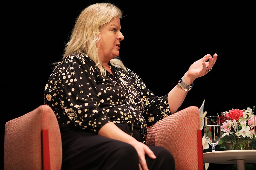 Town Hall Chair Ashley Brown ends the event with a Q&A with Barry.