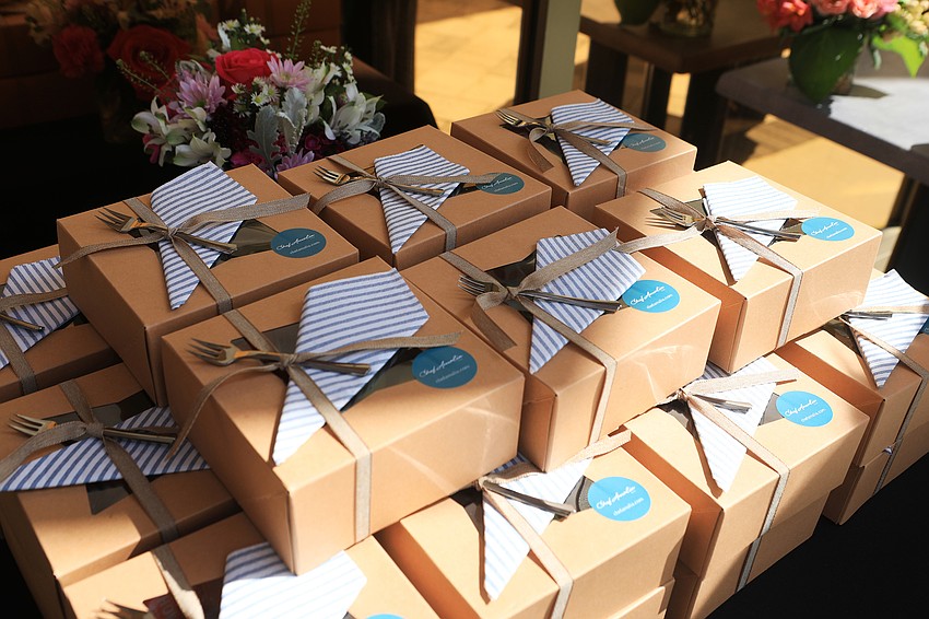 VIP attendees picked up gift boxes after the show.