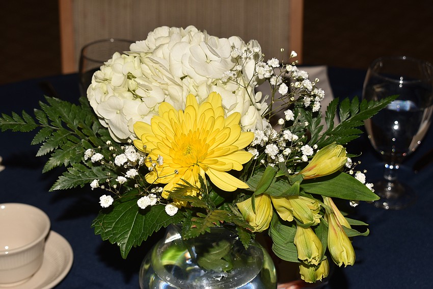 Karen Kennedy did the floral arrangements for the evening as a favor.