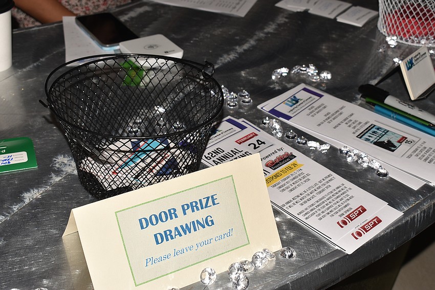 Members dropped their business cards in a basket for a chance to win donated prizes.