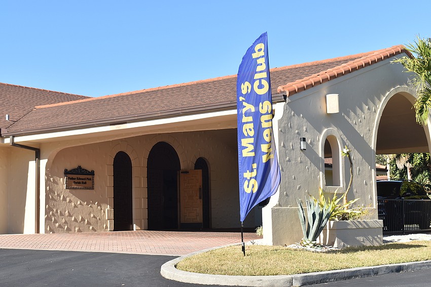 The men's club put out their banner to announce the party.