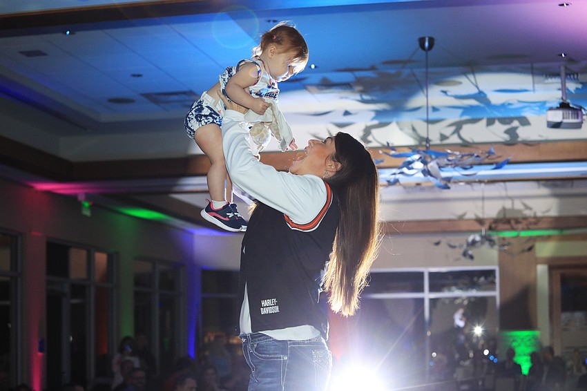 More than 40 models strut up and down the runway.