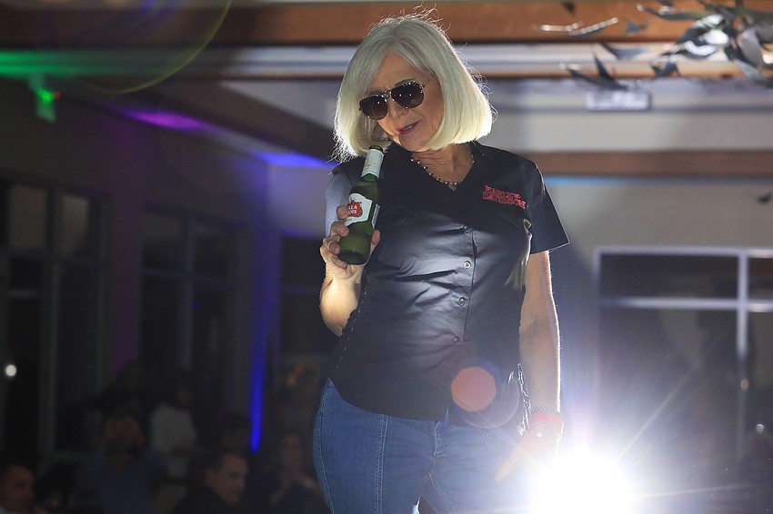 More than 40 models strut up and down the runway.