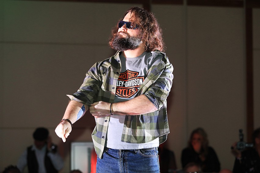 More than 40 models strut up and down the runway.