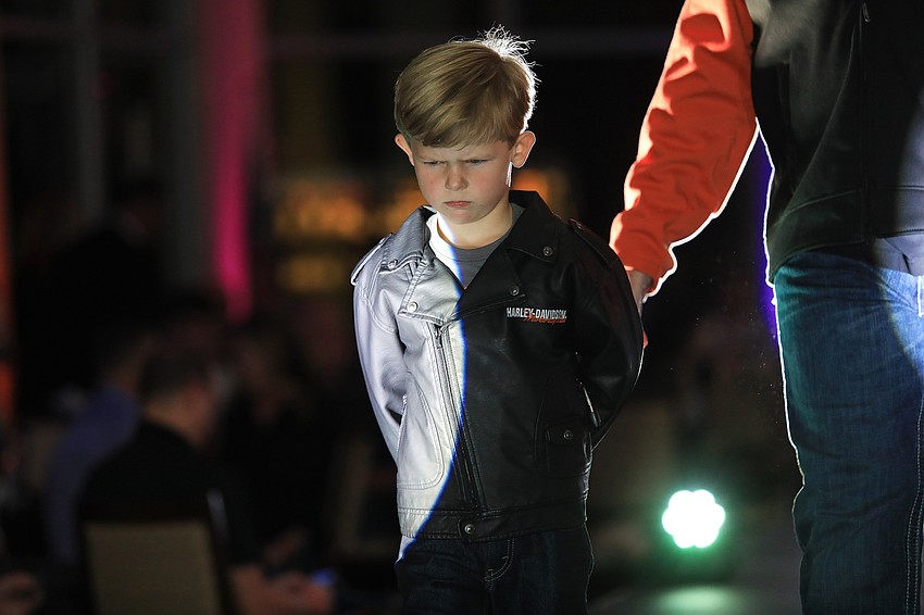 More than 40 models strut up and down the runway.