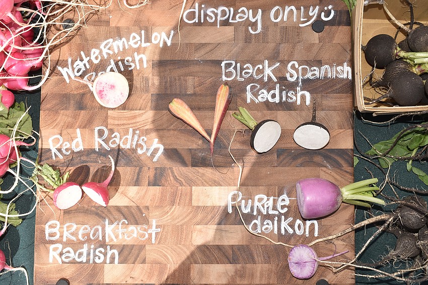 One produce vendor, Frog Song Organic and Honeyside Farms, set out an identifier for radishes.