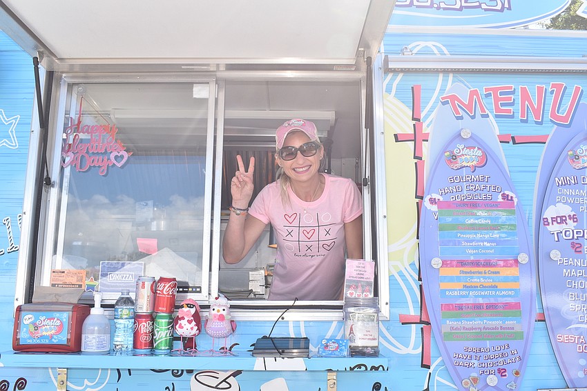 Amy Ebert waves from the Siesta Pops truck.