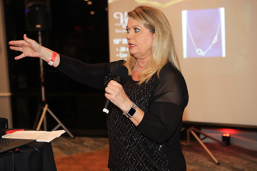 Co-chairwoman Peggy Kronus speaks to the audience.