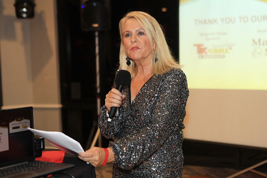 Co-chairwoman Becca Towery speaks to the audience.