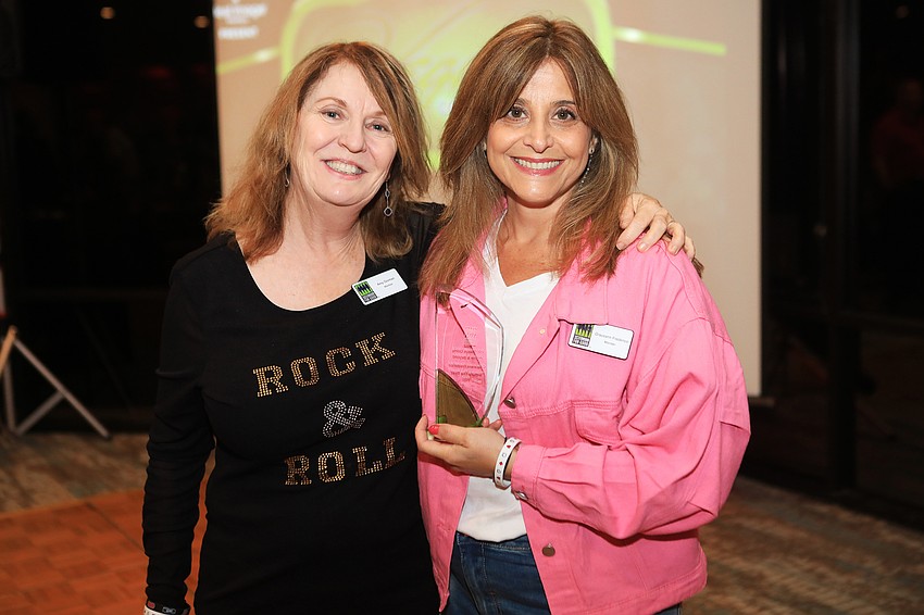 Board Chair Amy Gorman and award winner Graceann Frederico