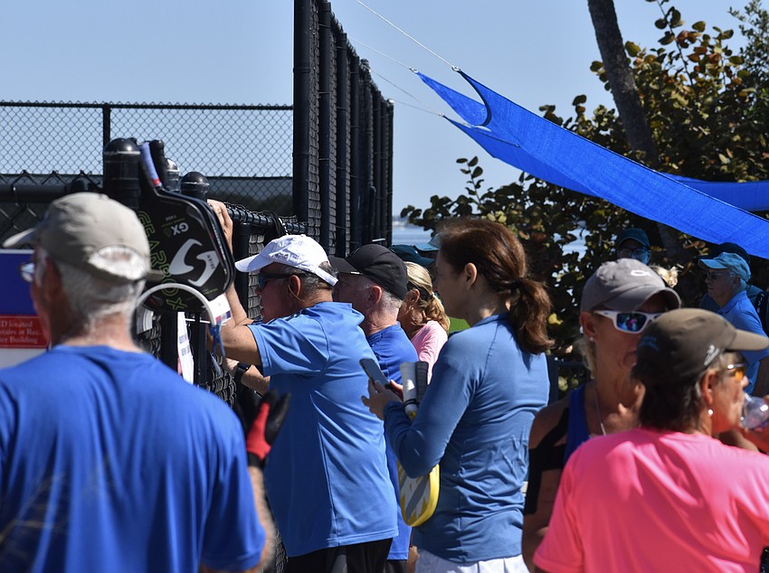 Players of the game say the social-gathering aspect of pickleball is one of the biggest draws.