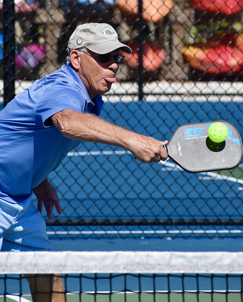 Art Davis handles a backhand volley.