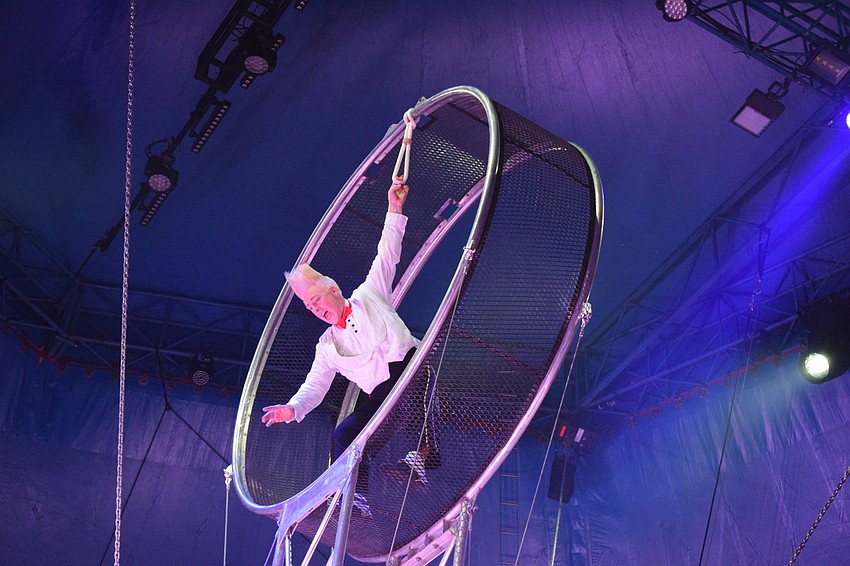 International circus star Bello Nock performs a daredevil stunt in the Wheel of Destiny.