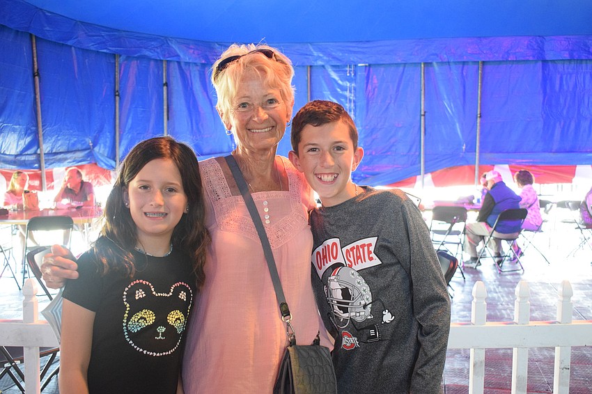 Naples' Sara Beechy, who is 8, attends Circus Sarasota with her grandmother Ester Beechy, who is visiting from Ohio, and her 11-year-old brother Bennett Beechy.