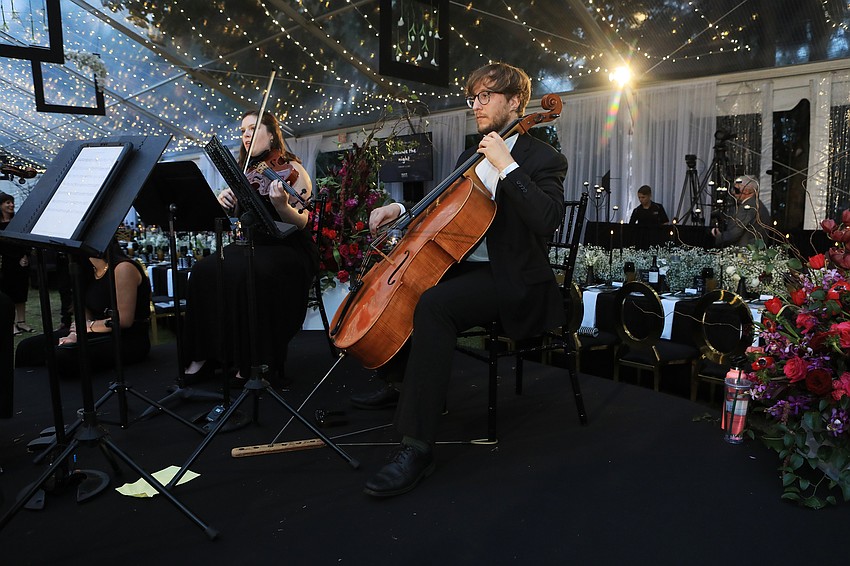 The Jade Strings quartet plays in the middle of the space.