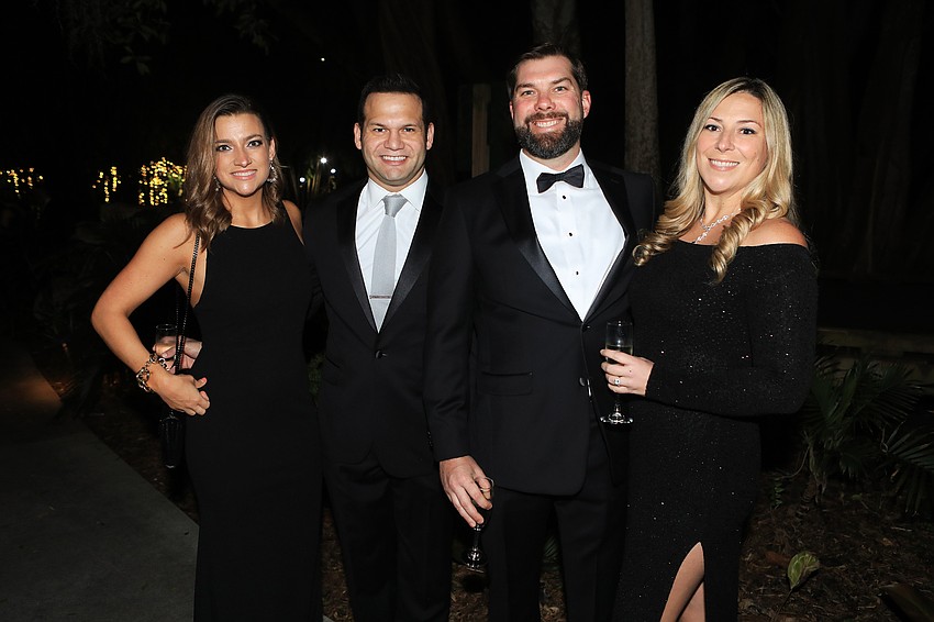 Victoria and Erik Arroyo with Ernie and Ashley Cave