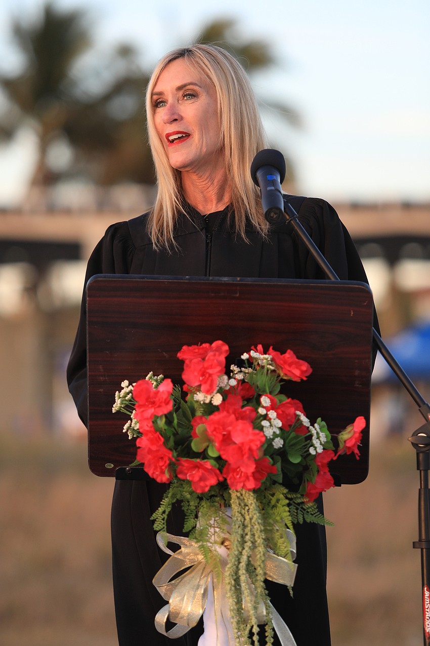 Judge Debra Johnes Riva addresses the crowd.