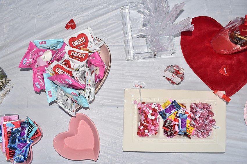 Valentine's Day snacks were set out on pink and red plates.
