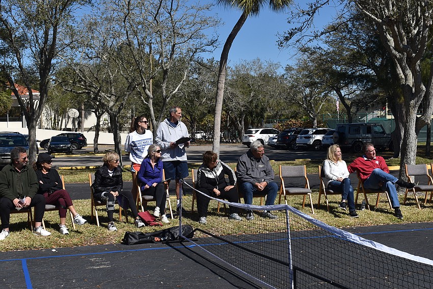 Other attendees watched from the sidelines while some played.